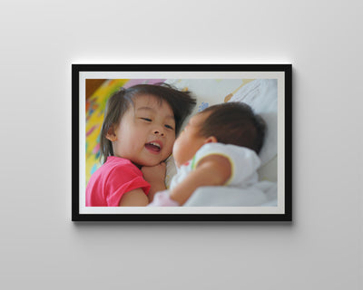 Playing With Newborn Sibling (Art Prints)