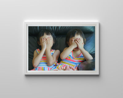 Sisters Covering Faces (Framed Prints)
